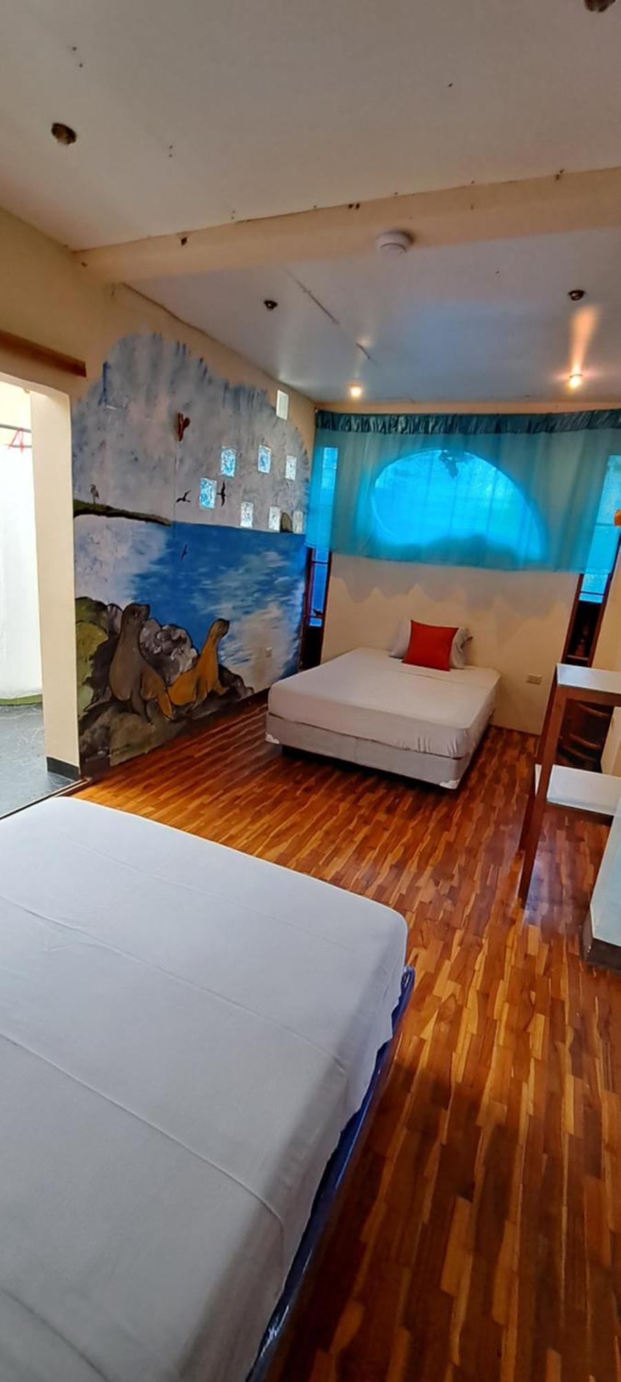 شقة Cozy Hosting Galapagos بويرتو أيورا الغرفة الصورة